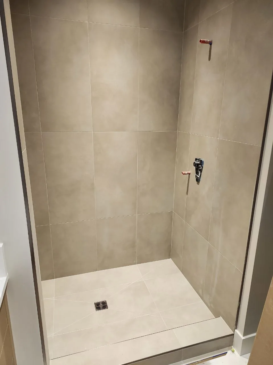 Full-height greige walls