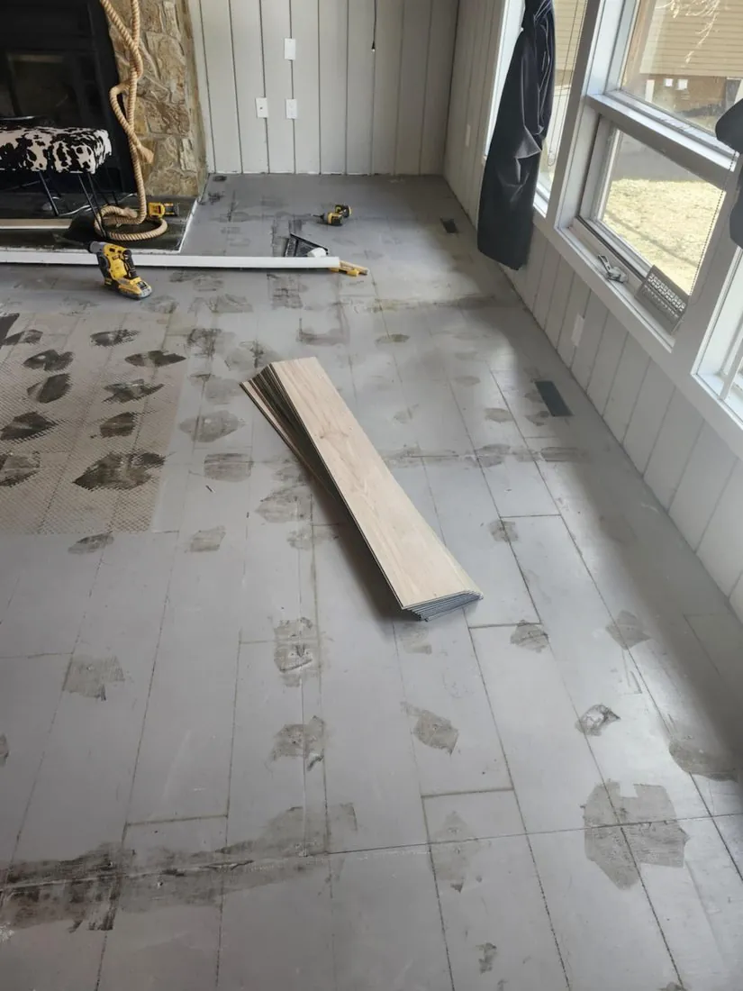 Subfloor prep, planks staged