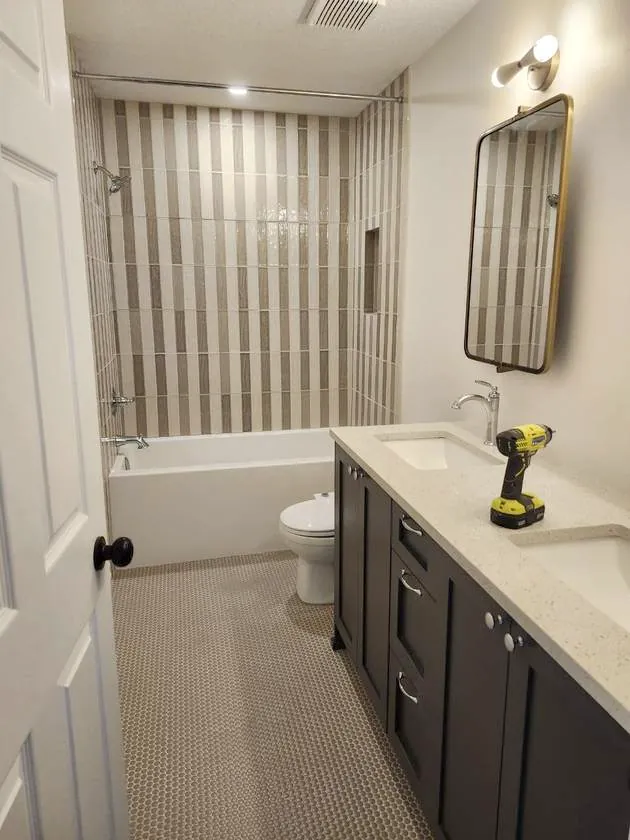 Double vanity & brass mirror