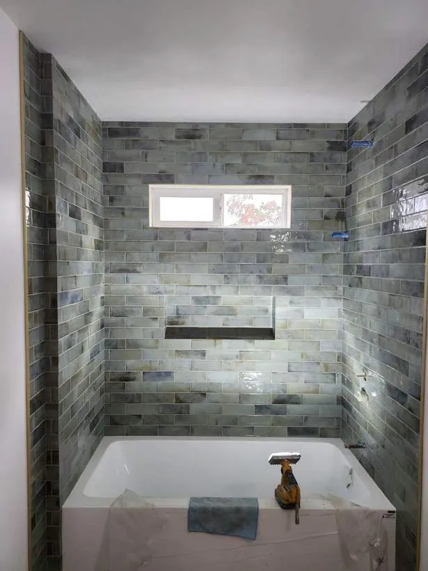 Iridescent glazed-tile tub surround