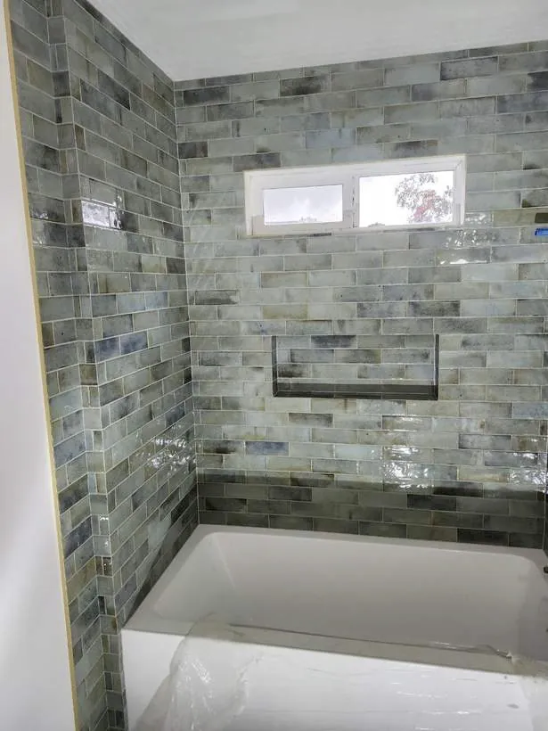 Finished tile to the ceiling