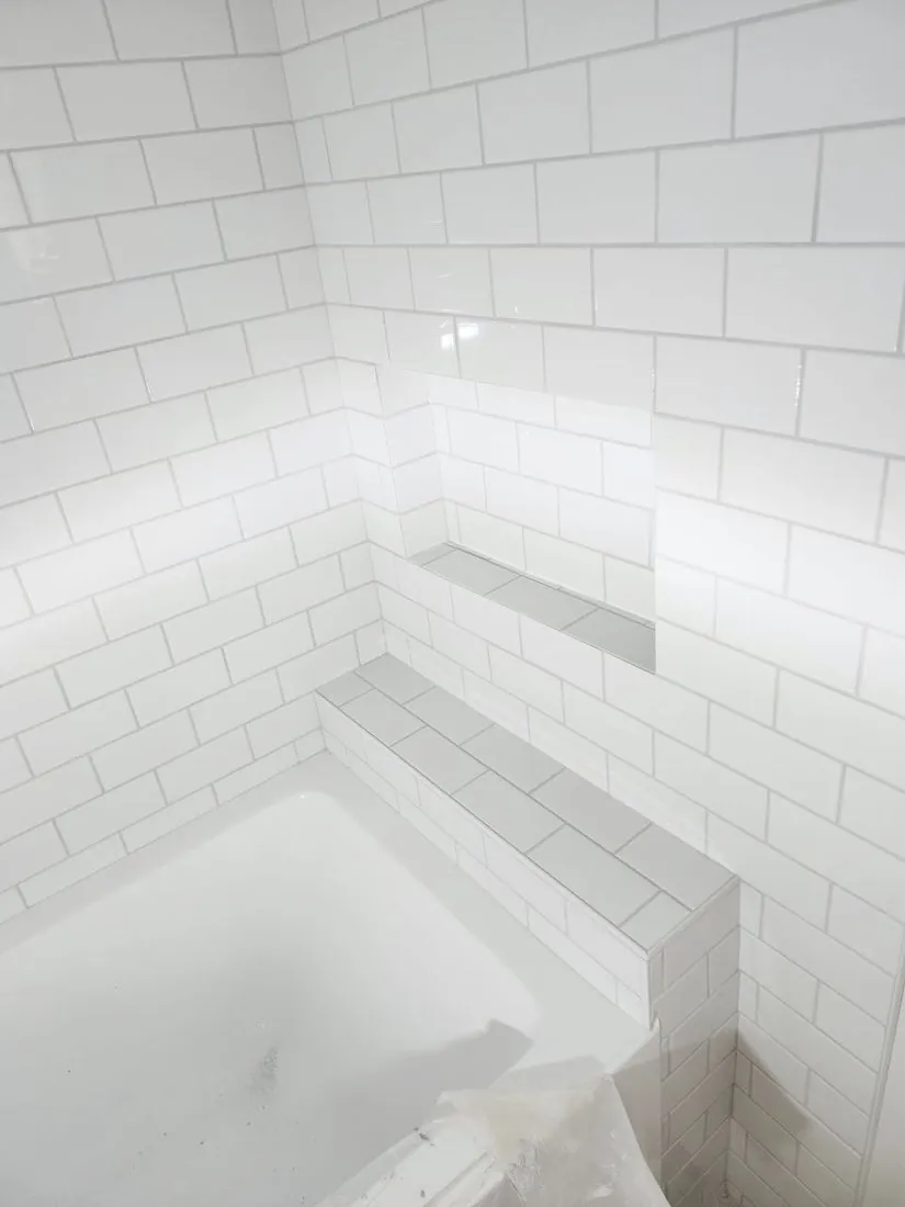 Tiled ledge over the tub