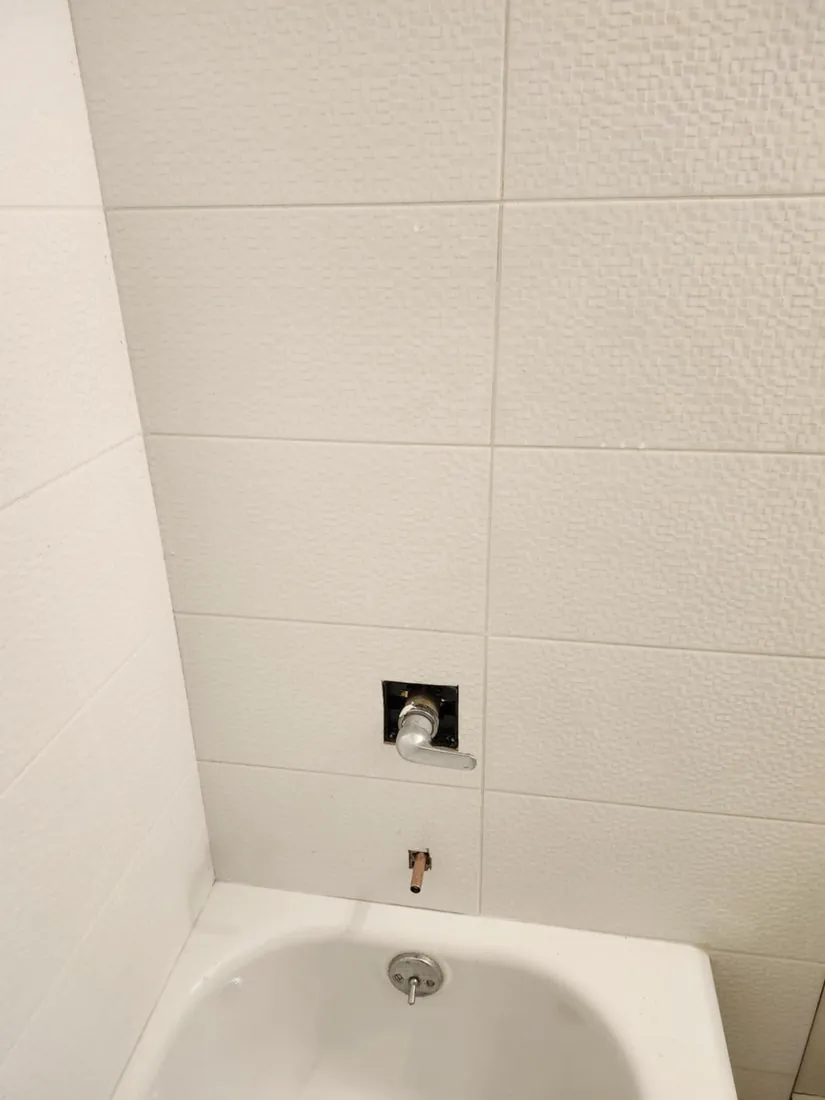 Tile set around the valve
