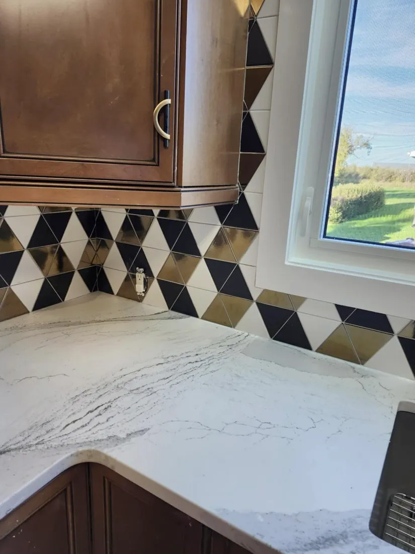Backsplash wrapped around the window