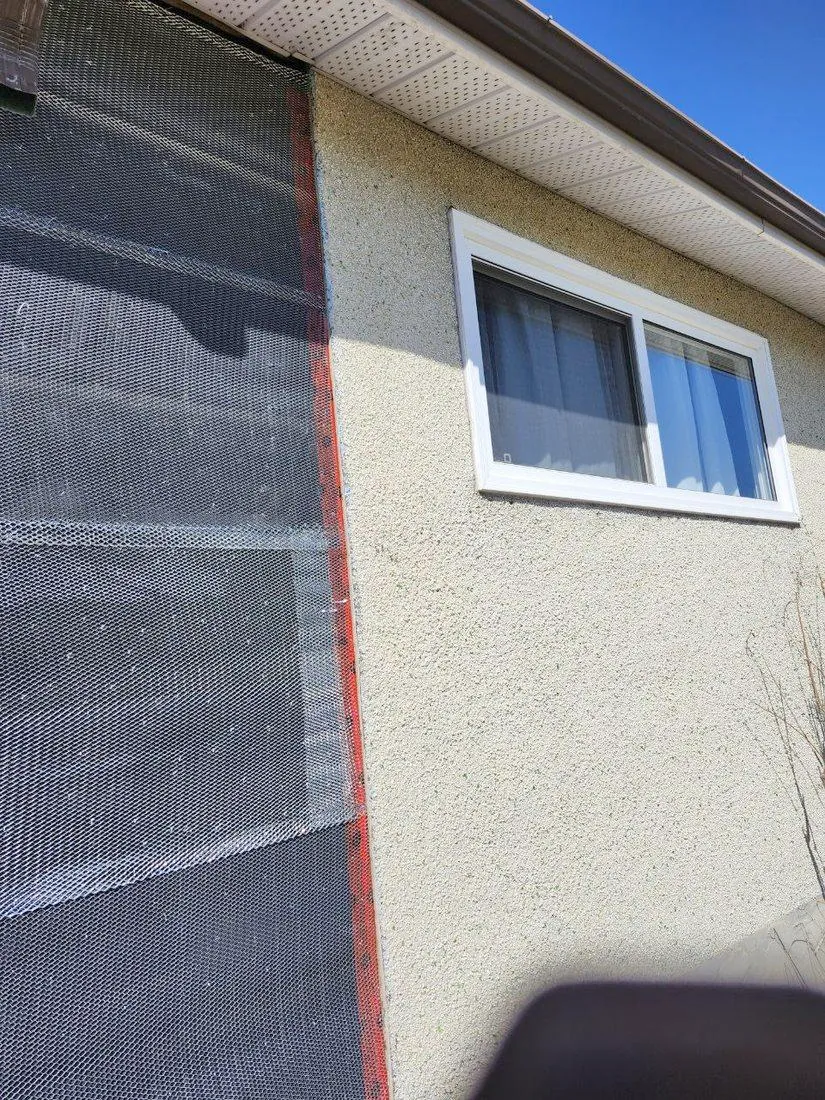 Metal lath over weather barrier