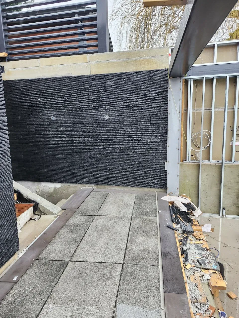 Stacked black-stone feature wall