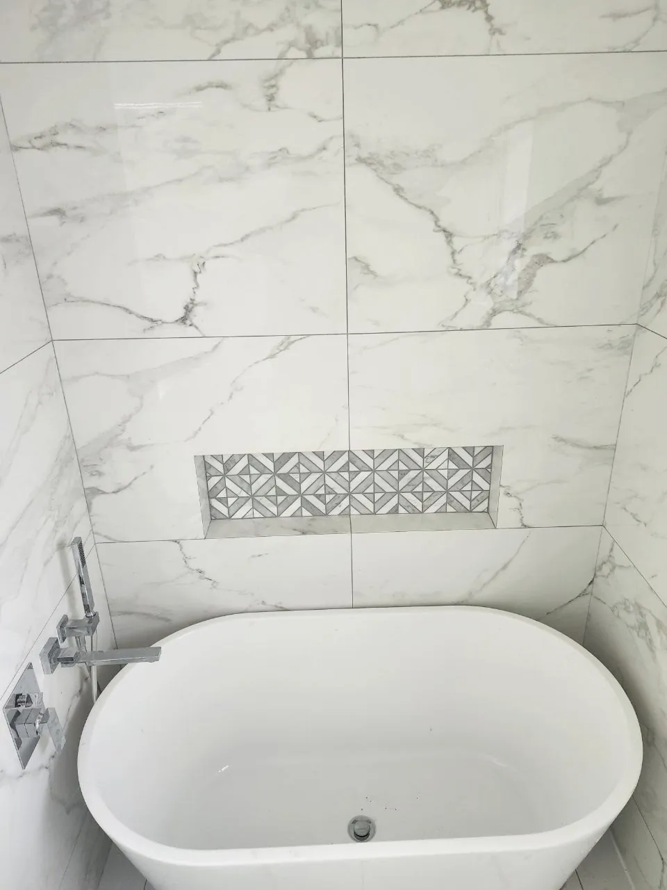 Geometric marble mosaic niche
