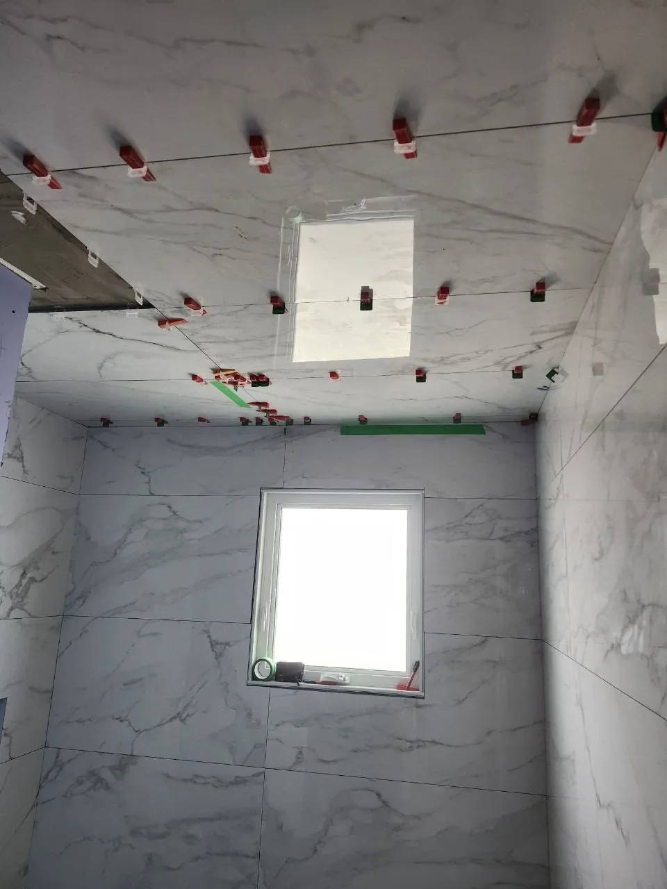 Tiling up to the window