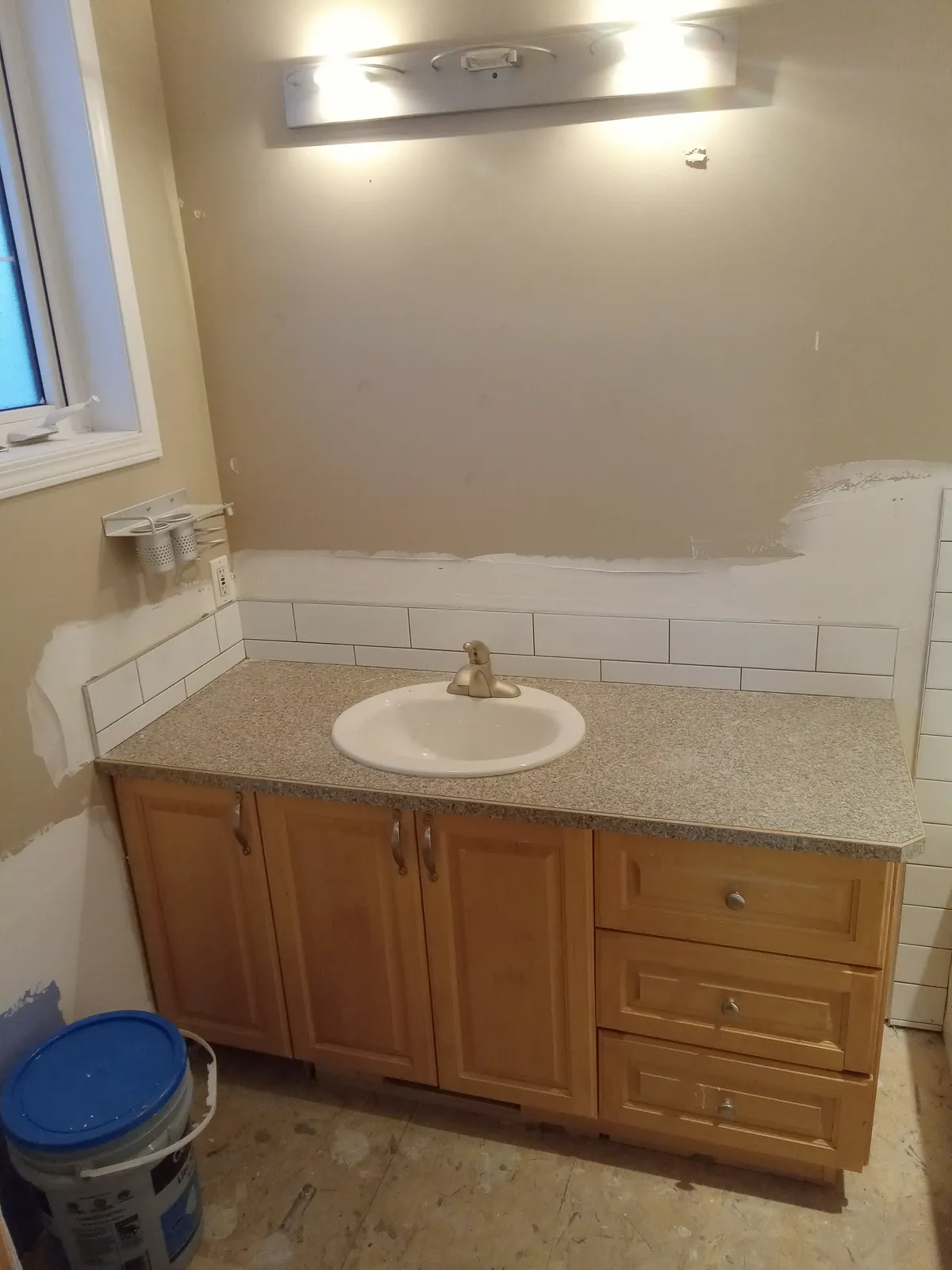 Vanity backsplash going in